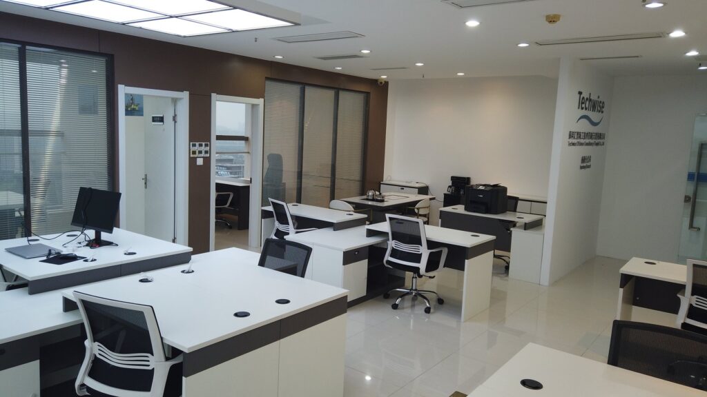 The open-plan Techwise Nantong branch office, with workstations and the Techwise logo on the wall